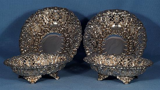 A matched set of four Victorian embossed silver dishes (two pairs), by Horace Woodward & Co/ Ltd, length largest 245mm, weight 56oz